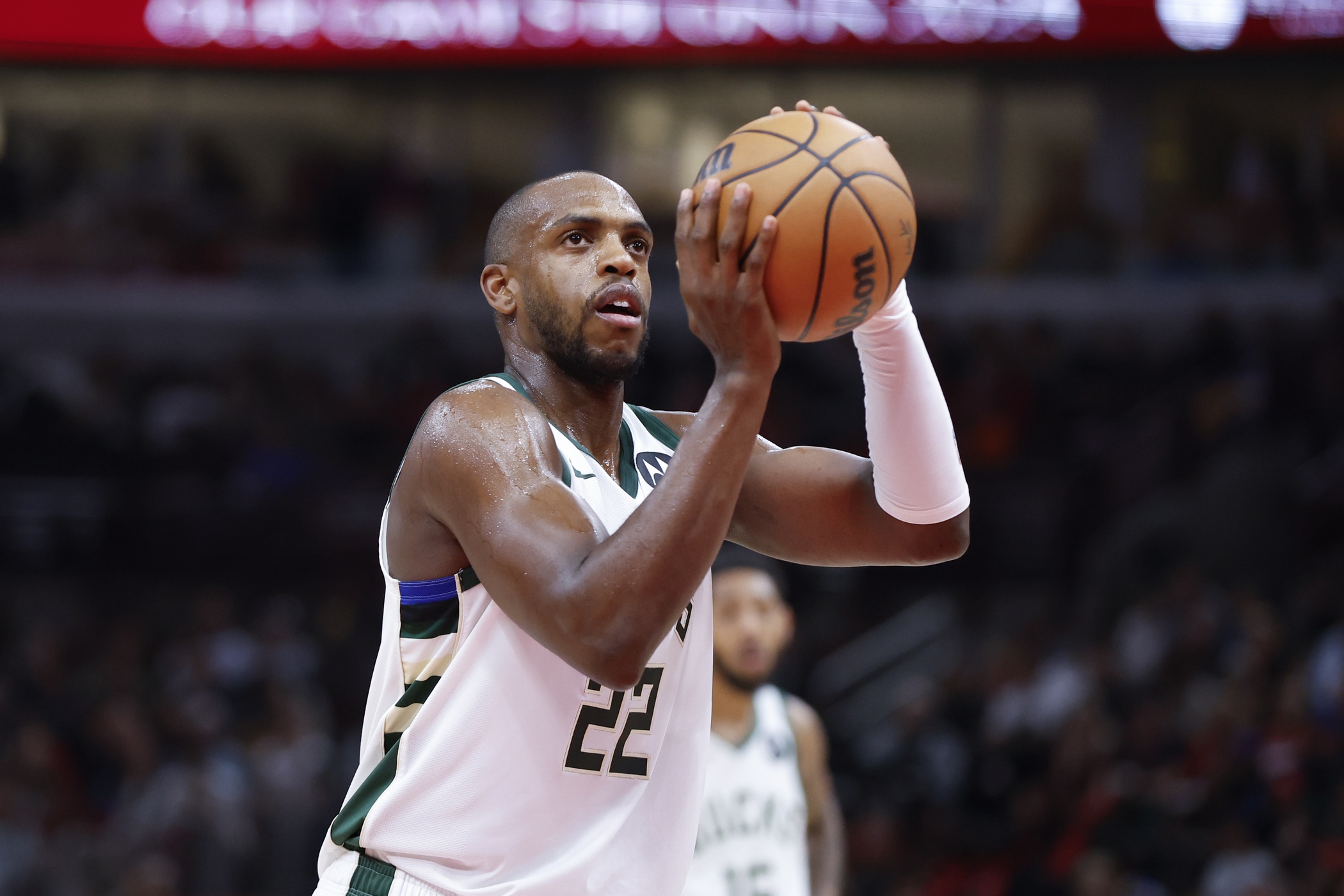 Milwaukee Bucks forward Khris Middleton (22) shoots a free throw against the Chicago Bulls 